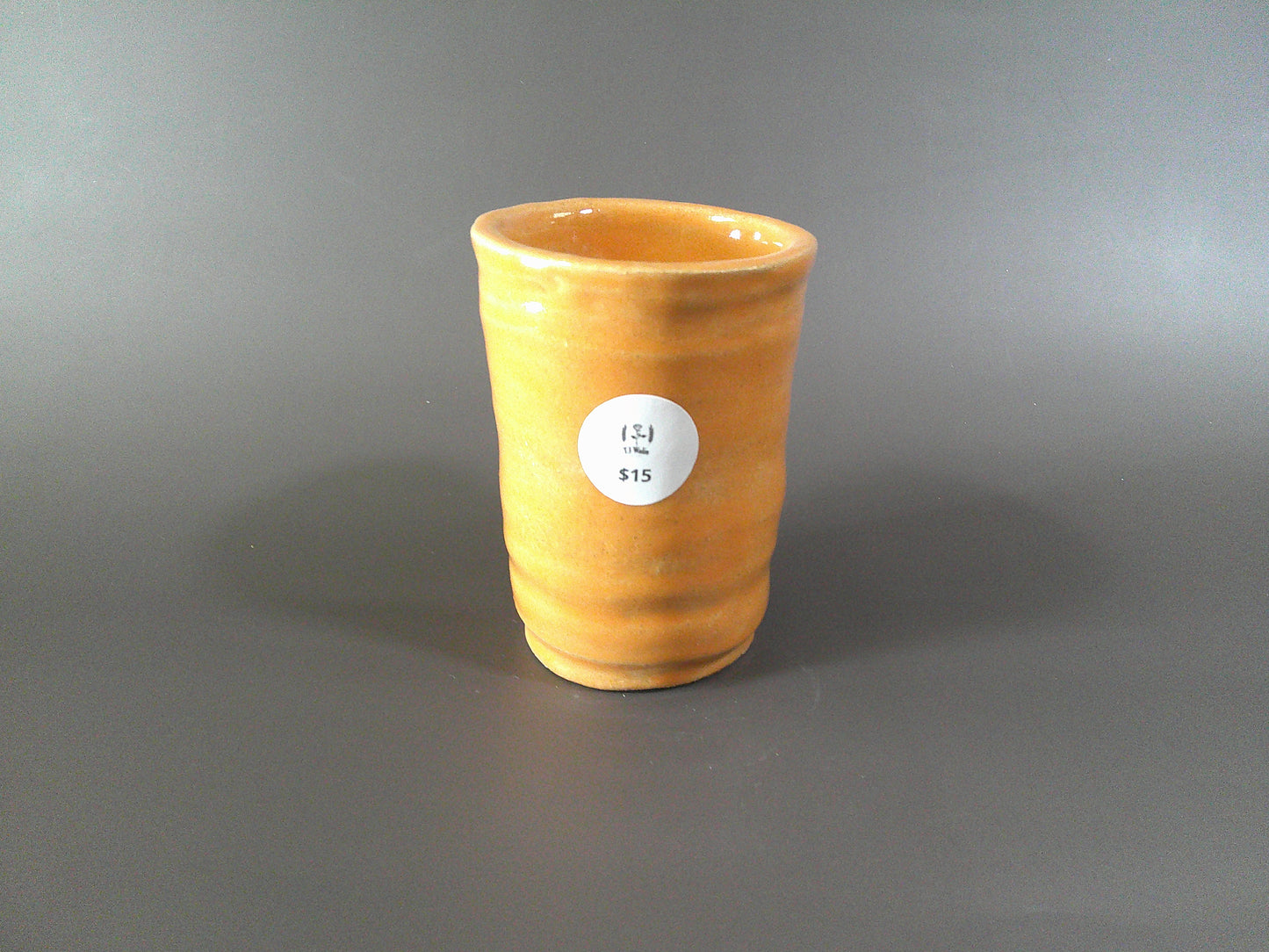 Small Orange Pottery piece $15