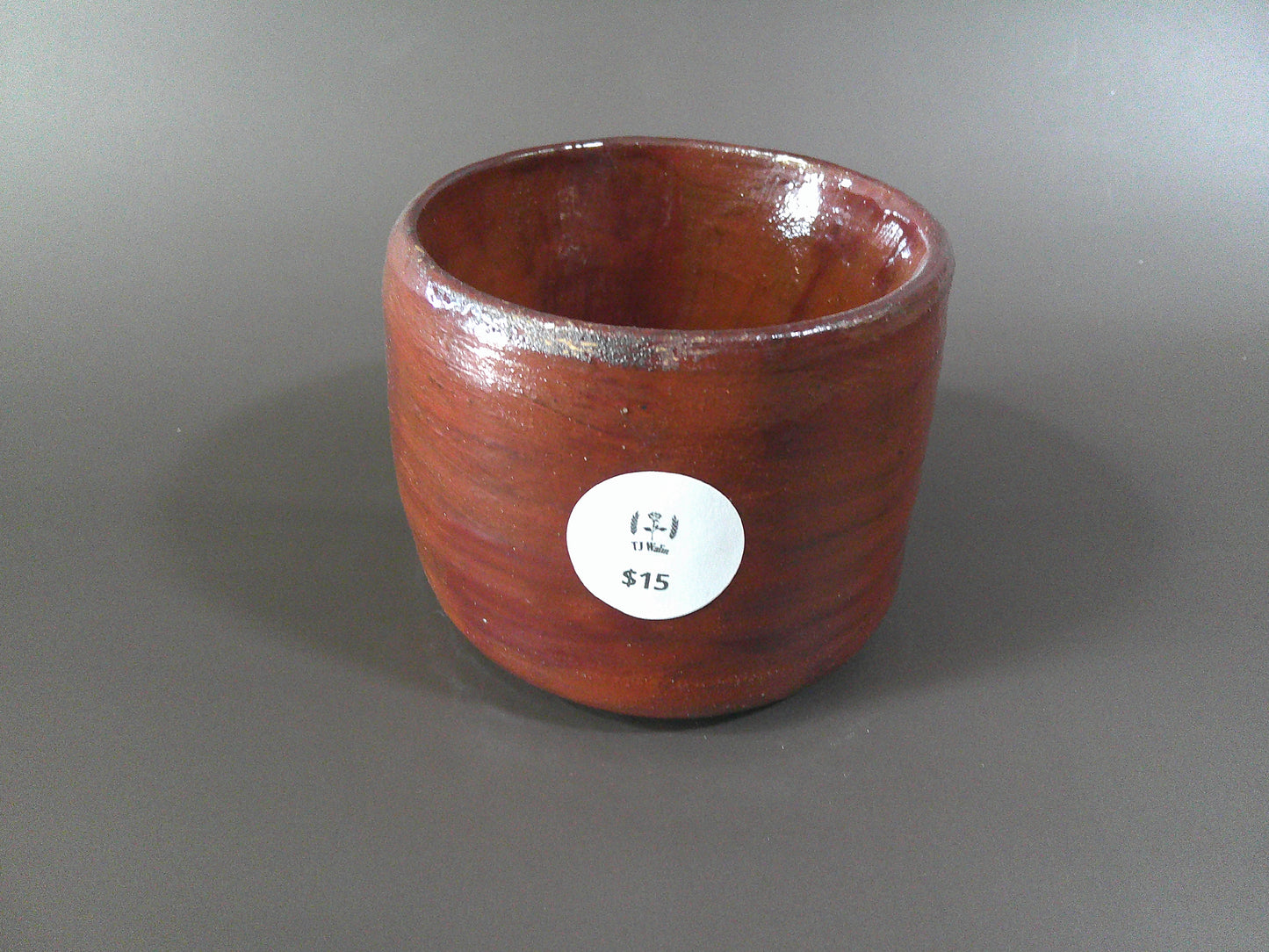 Brown/Burgundy Pottery Piece $15